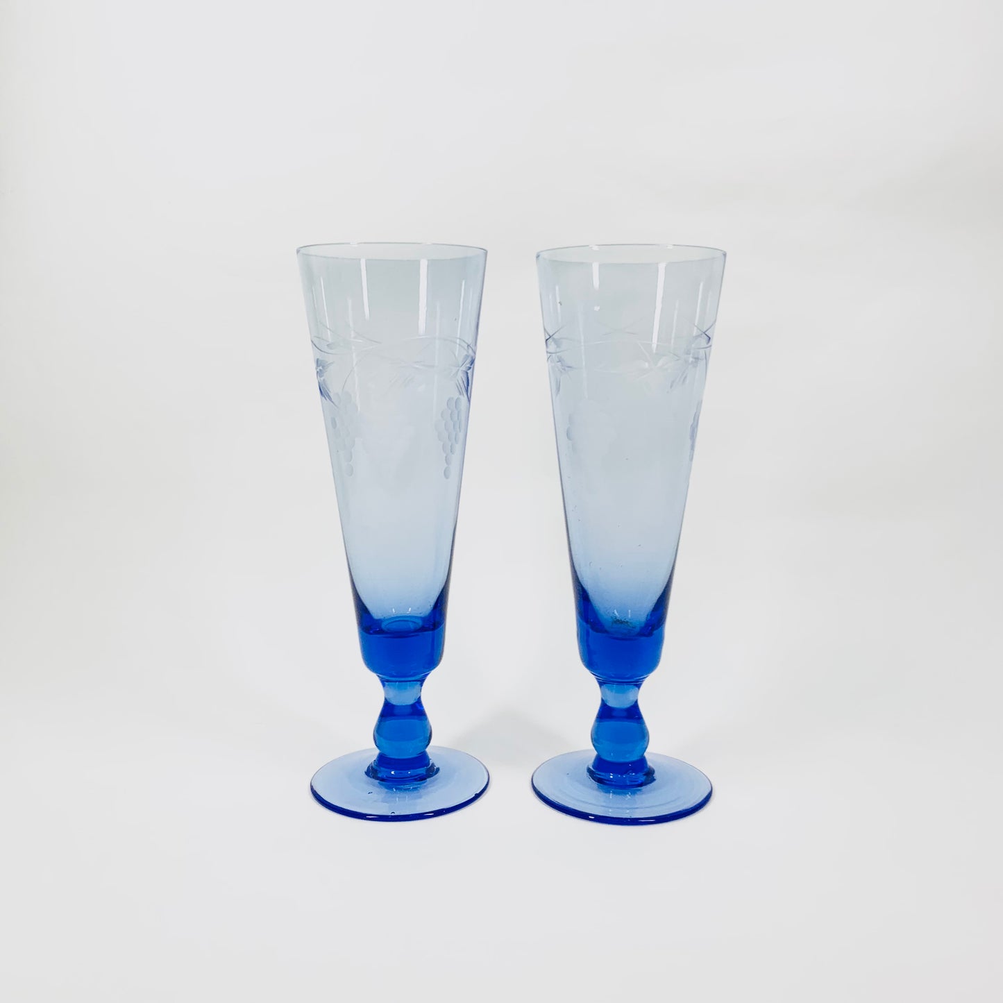 1940s blue etched vine pattern glass champagne flutes