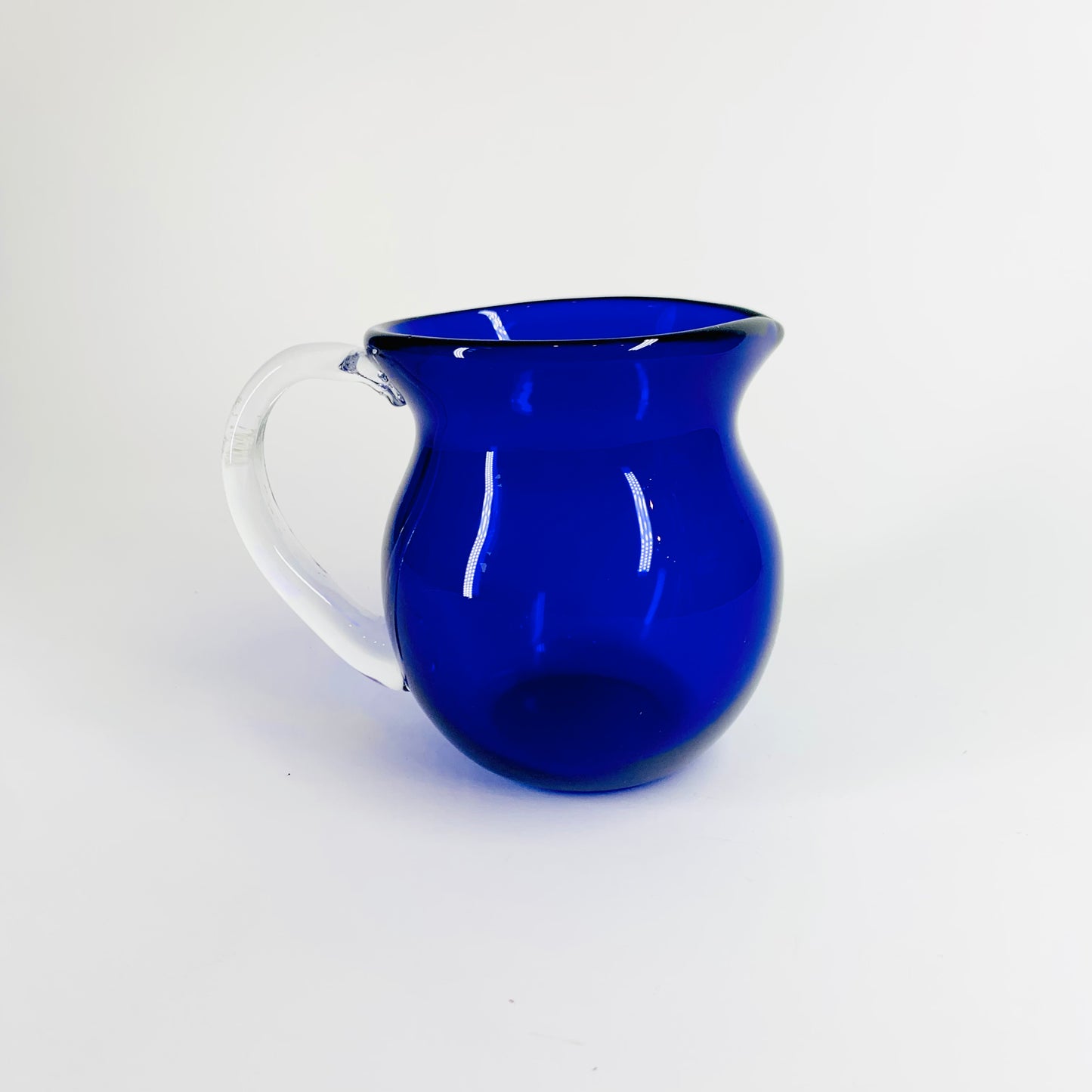 MCM blue glass mini jug with clear glass handle