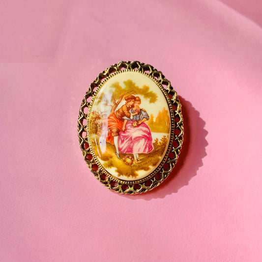 Antique hand painted Limoges porcelain brooch with filigree edge