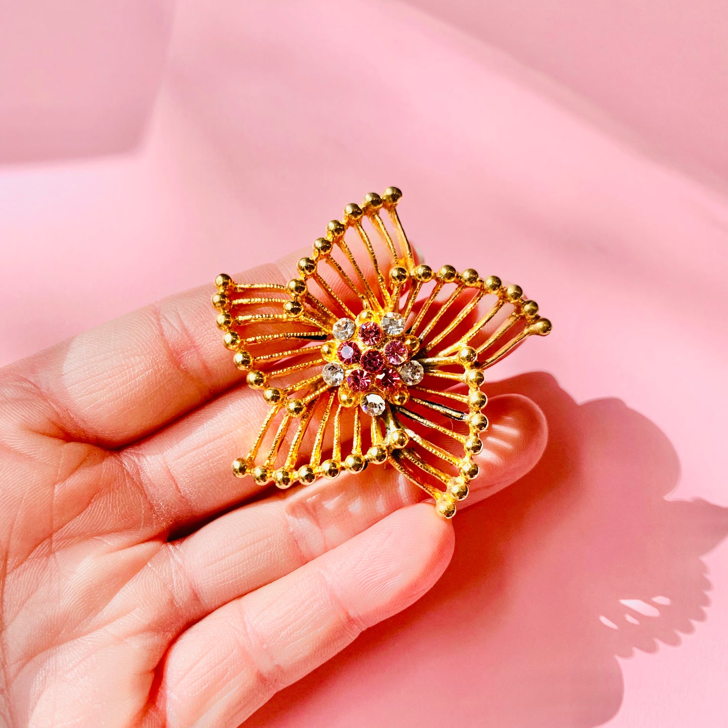 1960s gold plated alloy starburst brooch