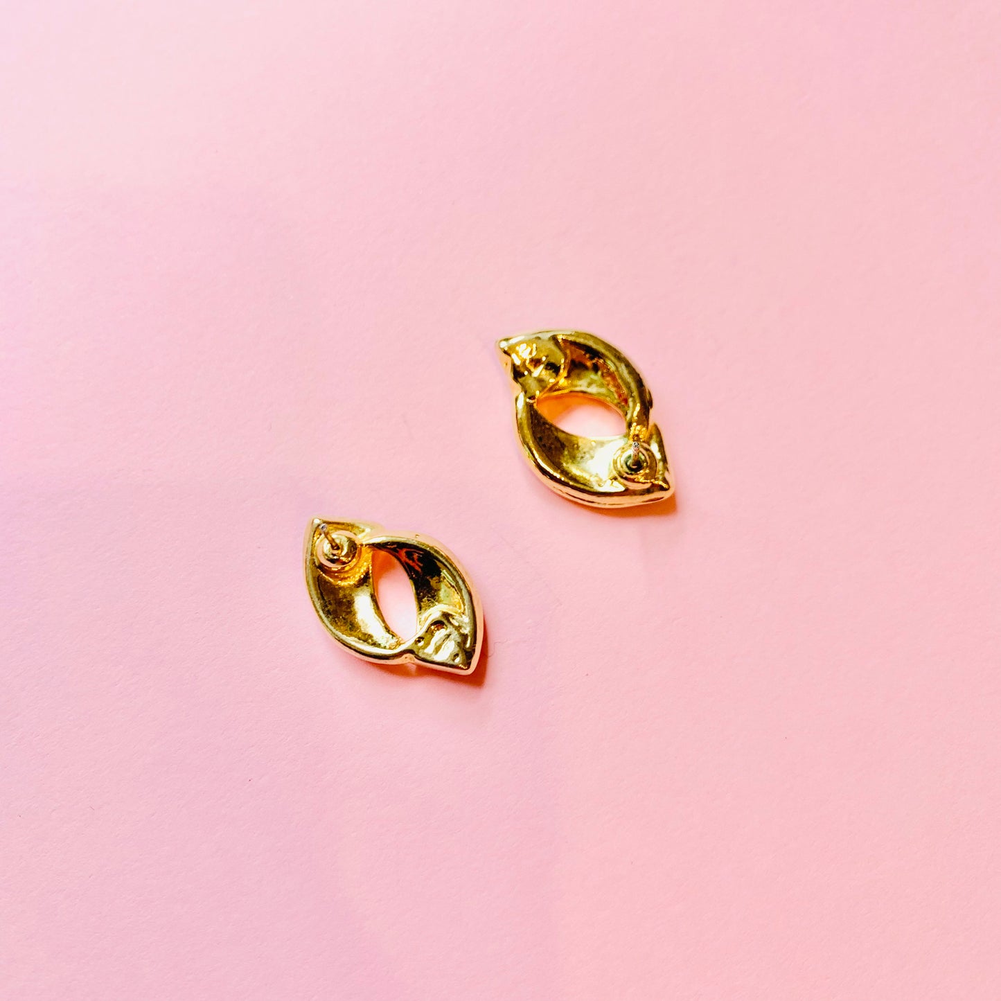 1960s gold plated black enamel stud earrings with rhinestones halo