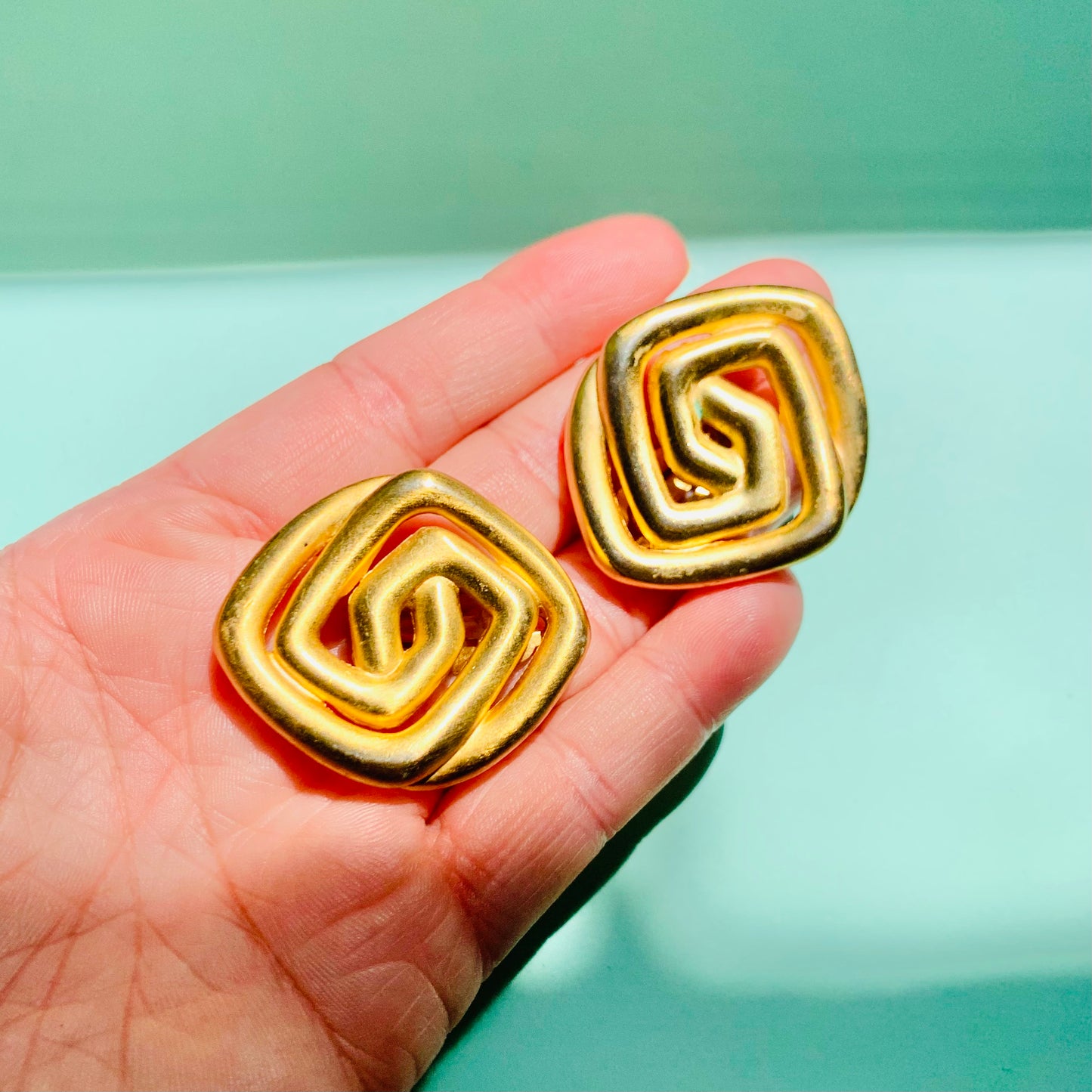 1980s French triple plated gold square scroll knot clip on earrings