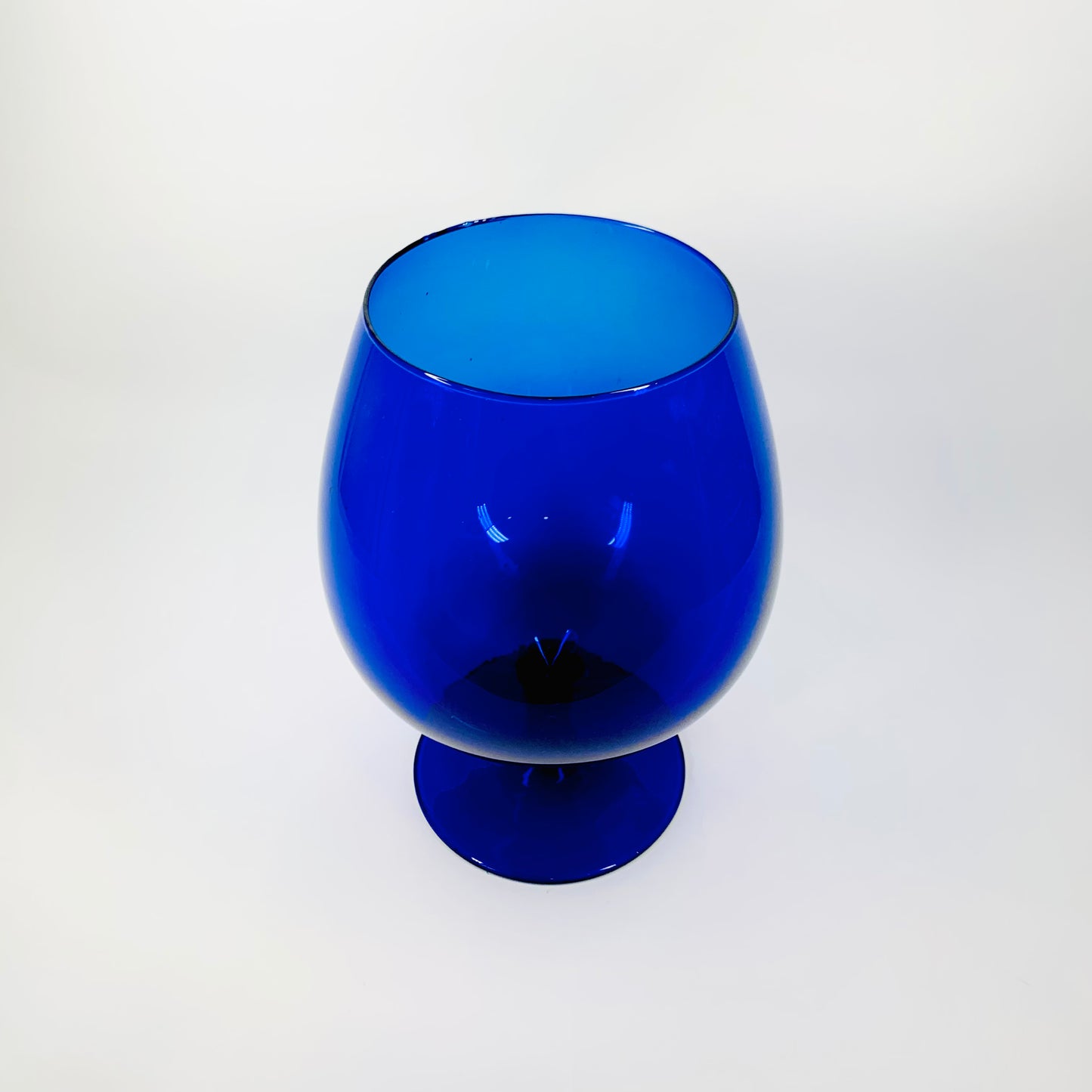 Large Midcentury Italian cobalt blue glass brandy balloon vase with clear stem
