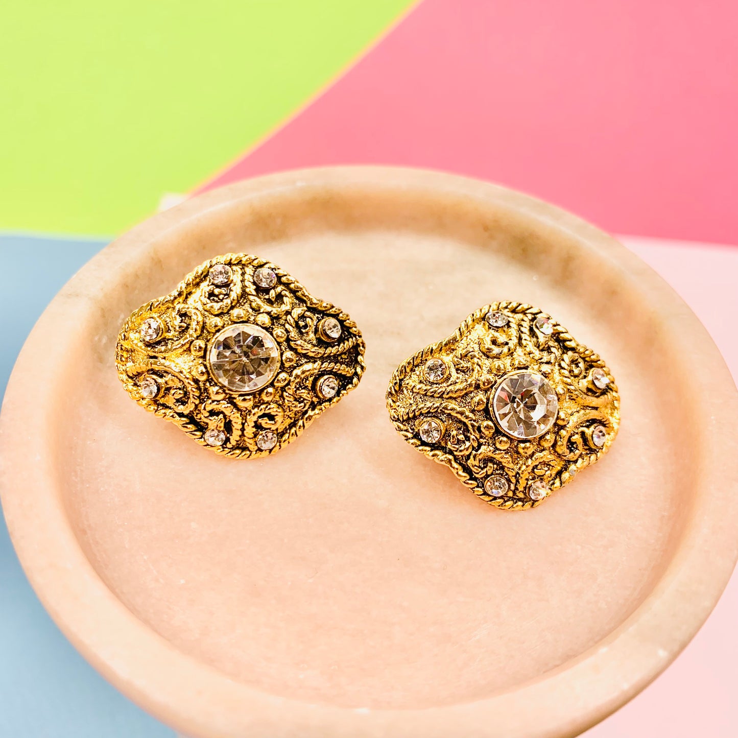 Extremely rare 1950s brass gilt clip on button earrings with clear rhinestones and filigree