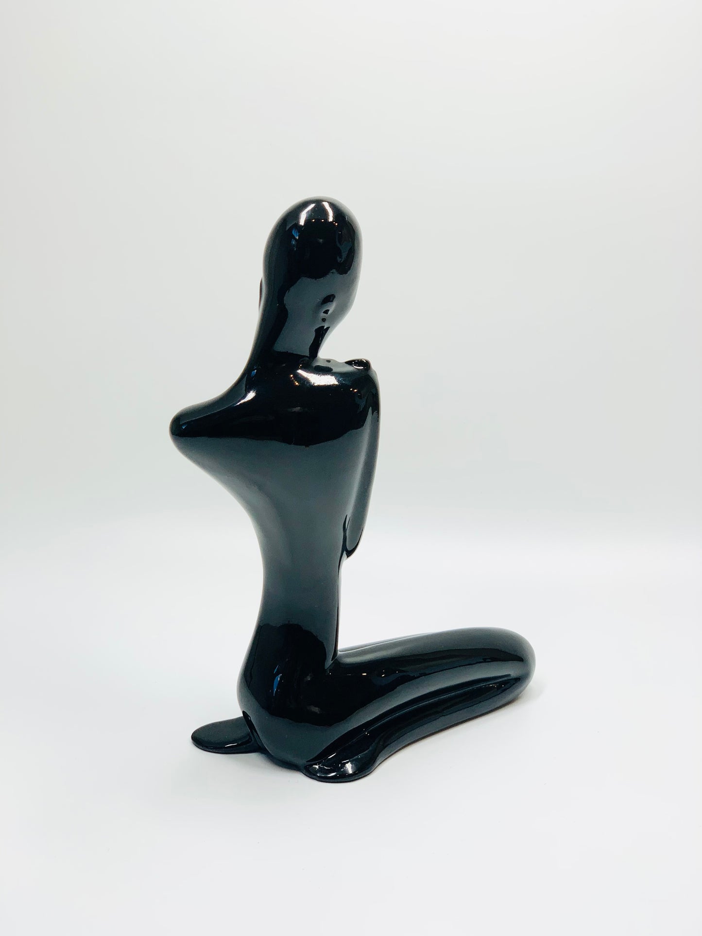 Midcentury black porcelain figurine