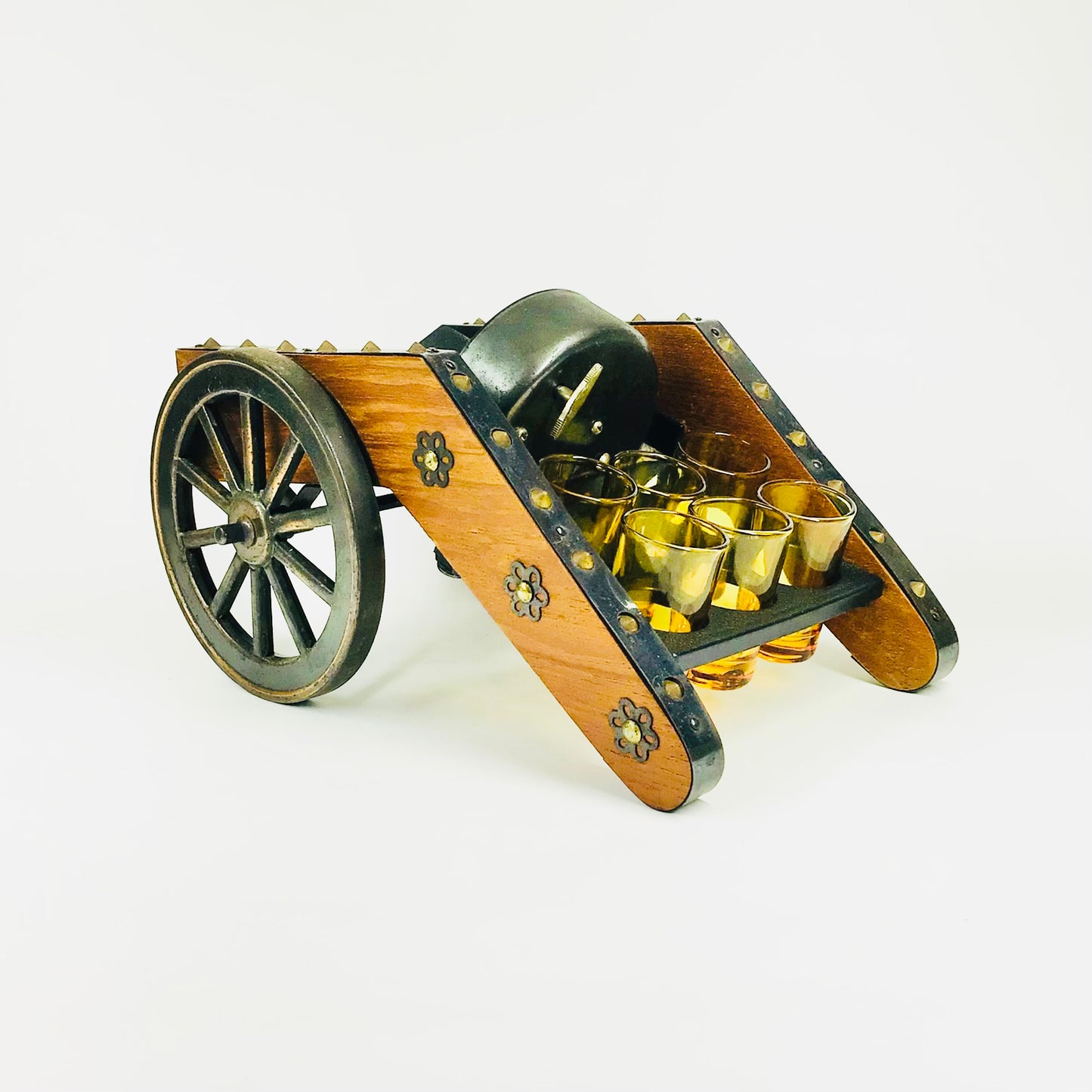 Retro wagon carrying amber shot glasses with bottle slot