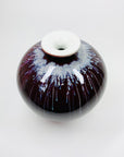 Vintage Chinese maroon bleed flambé pottery squat vase