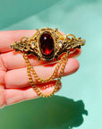 Stunning 1950s plated alloy Barcs brooch with red paste