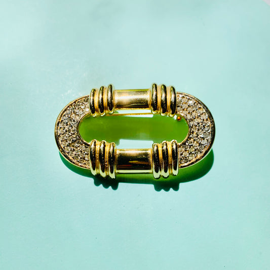 Extremely extremely rare 1980s gold plated buckle brooch by David Gross