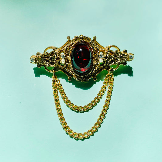 Stunning 1950s plated alloy Barcs brooch with red paste