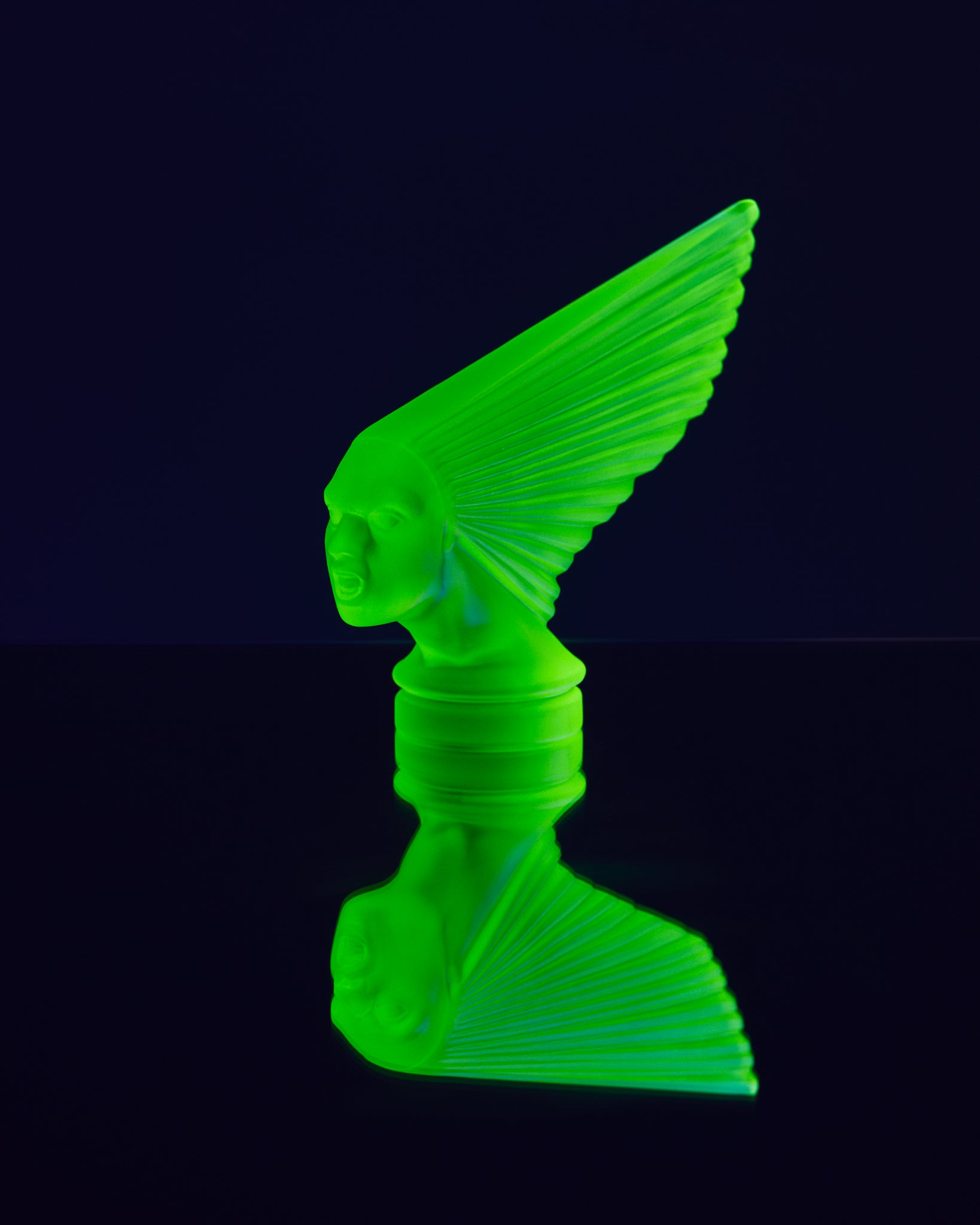 Art Deco reproduction of Lalique car mascot Victoire in uranium glass