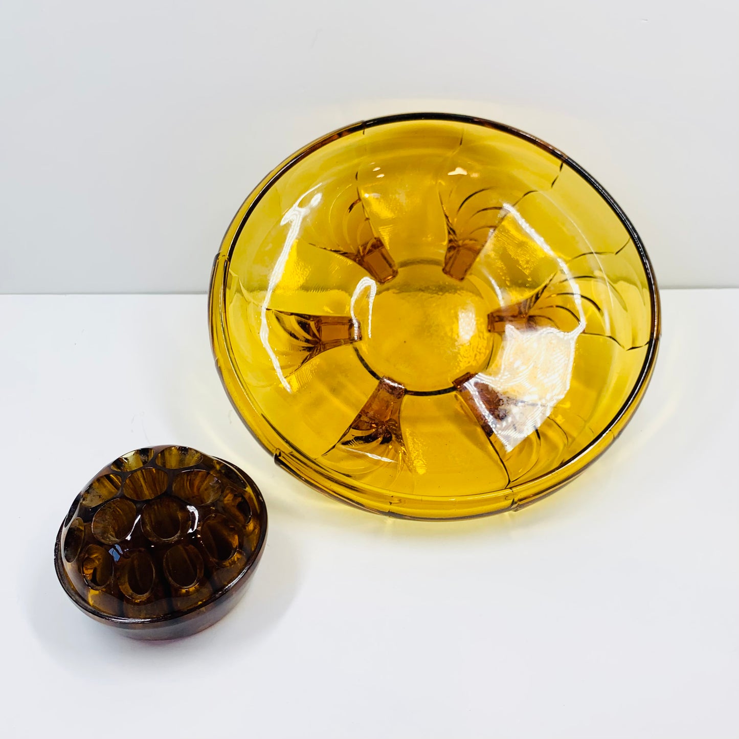 Antique Art Deco amber glass float bowl with matching flower frog