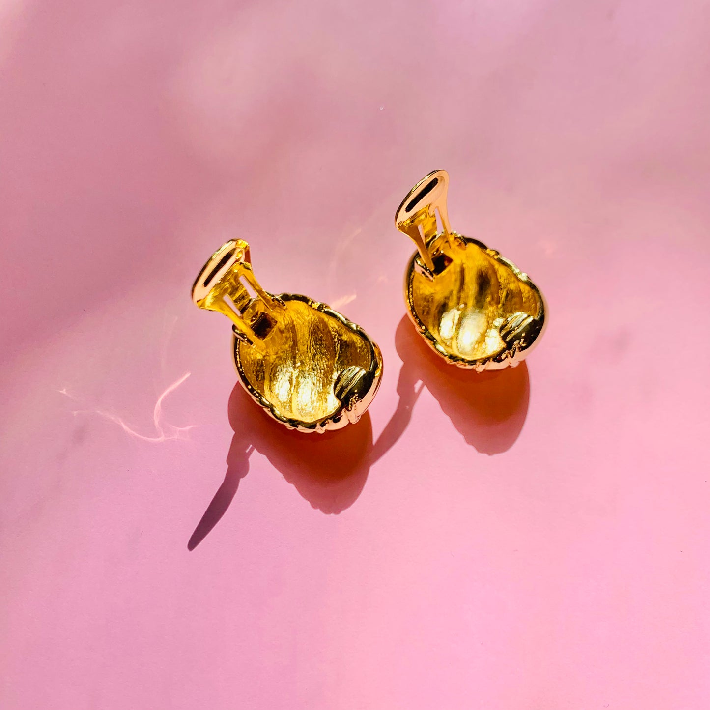 1960s Barcs triple gold plated ribbed cocoon clip on earrings by Monet