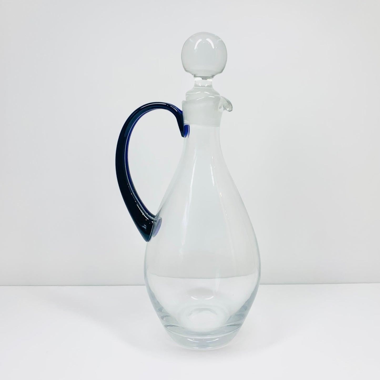 Vintage Italian glass decanter with cobalt handle