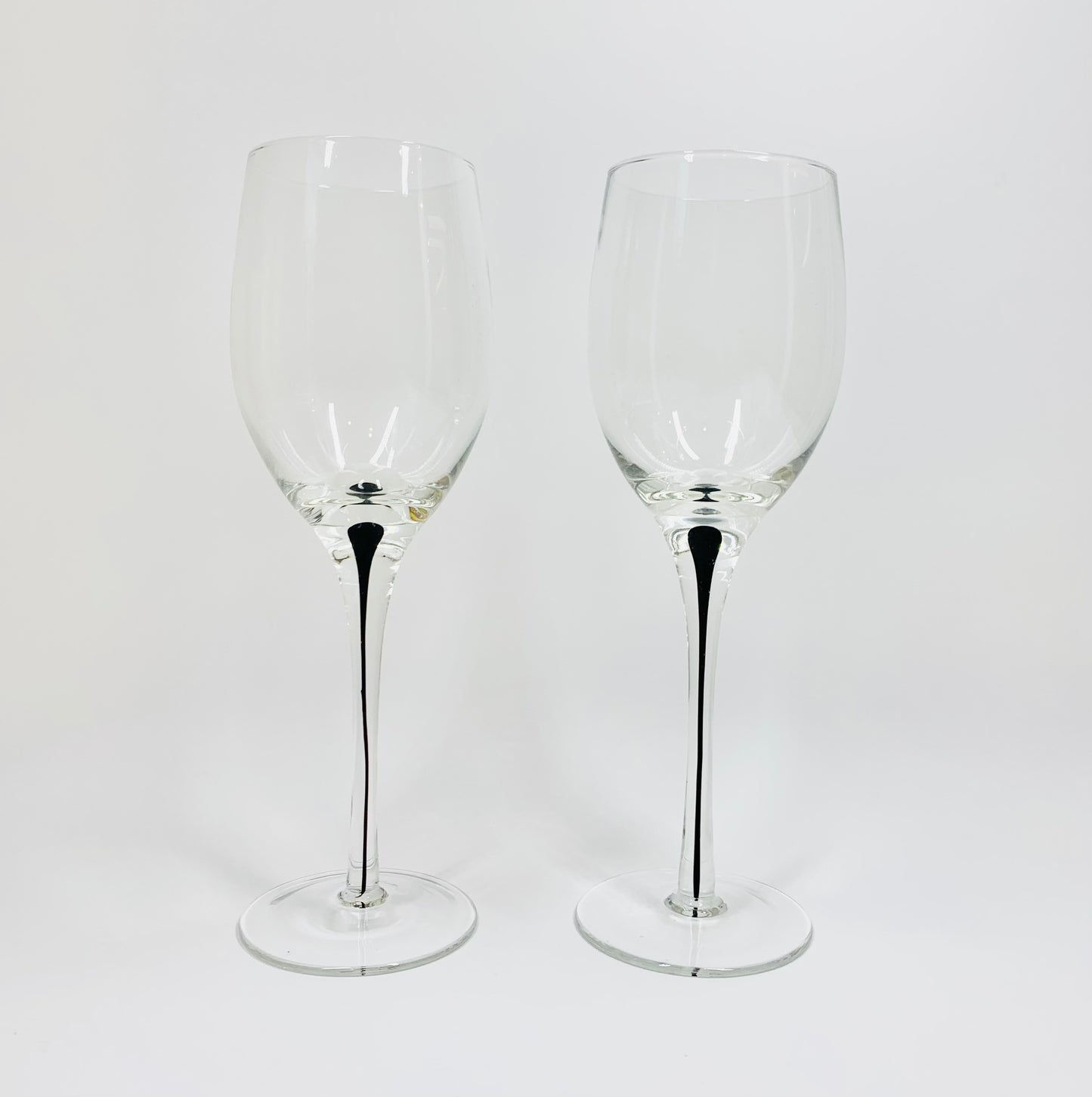 Vintage Kosta Boda hand made art glass wine glasses with encased black ink