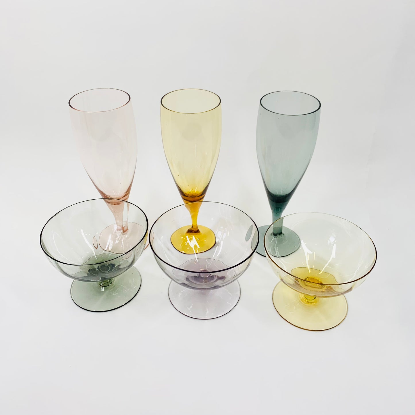 Rare Midcentury mix set of harlequin glass coupe and flutes
