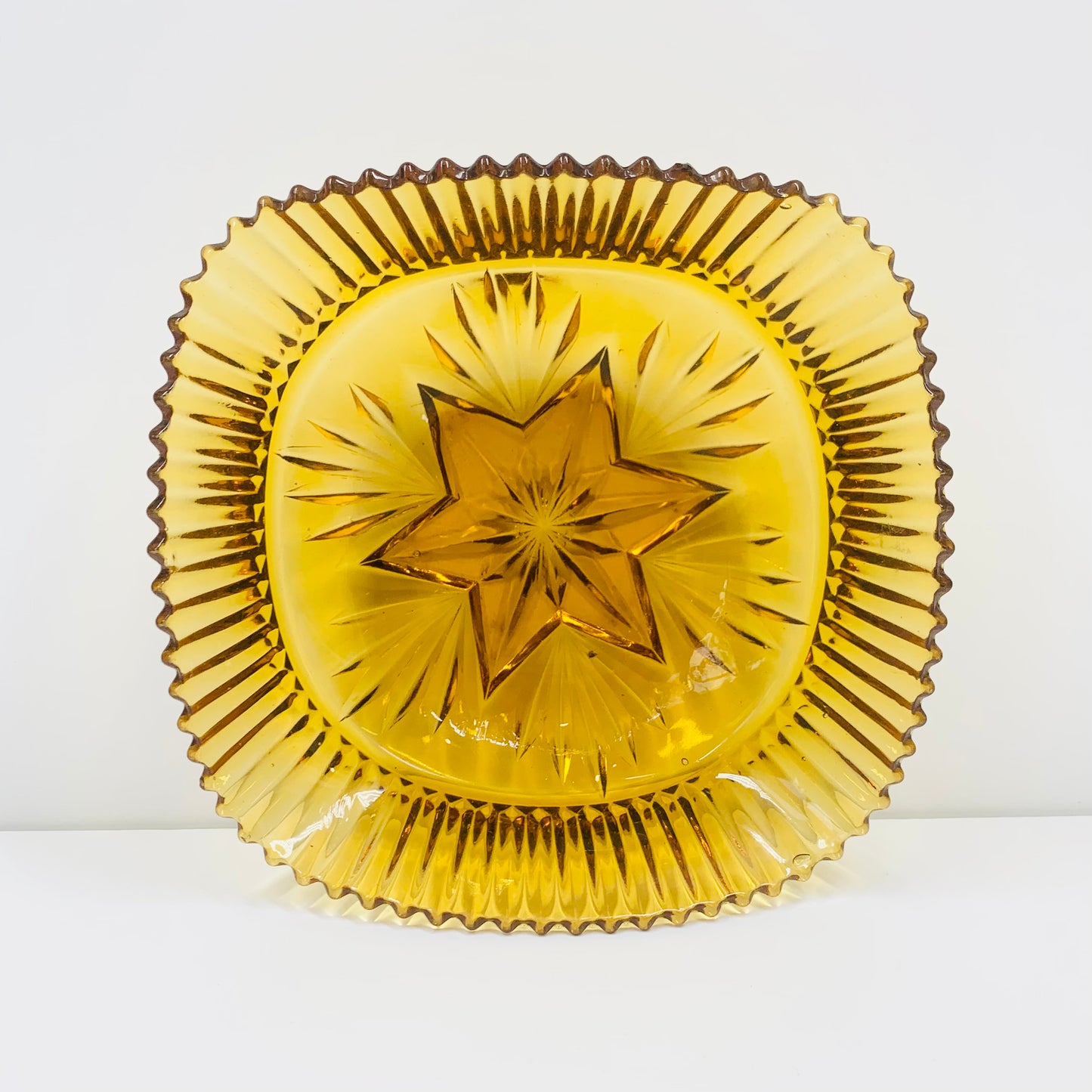 Art Deco amber glass bowl star pattern
