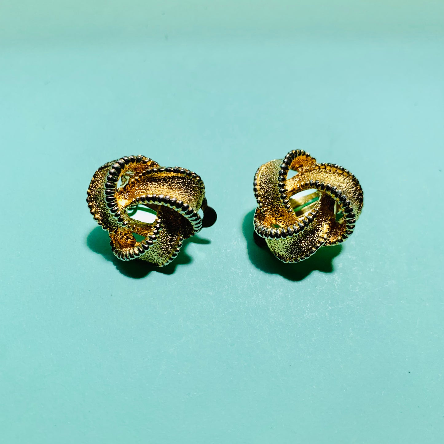 1960s French triple gold plated filigree trilogy knot clip on earrings