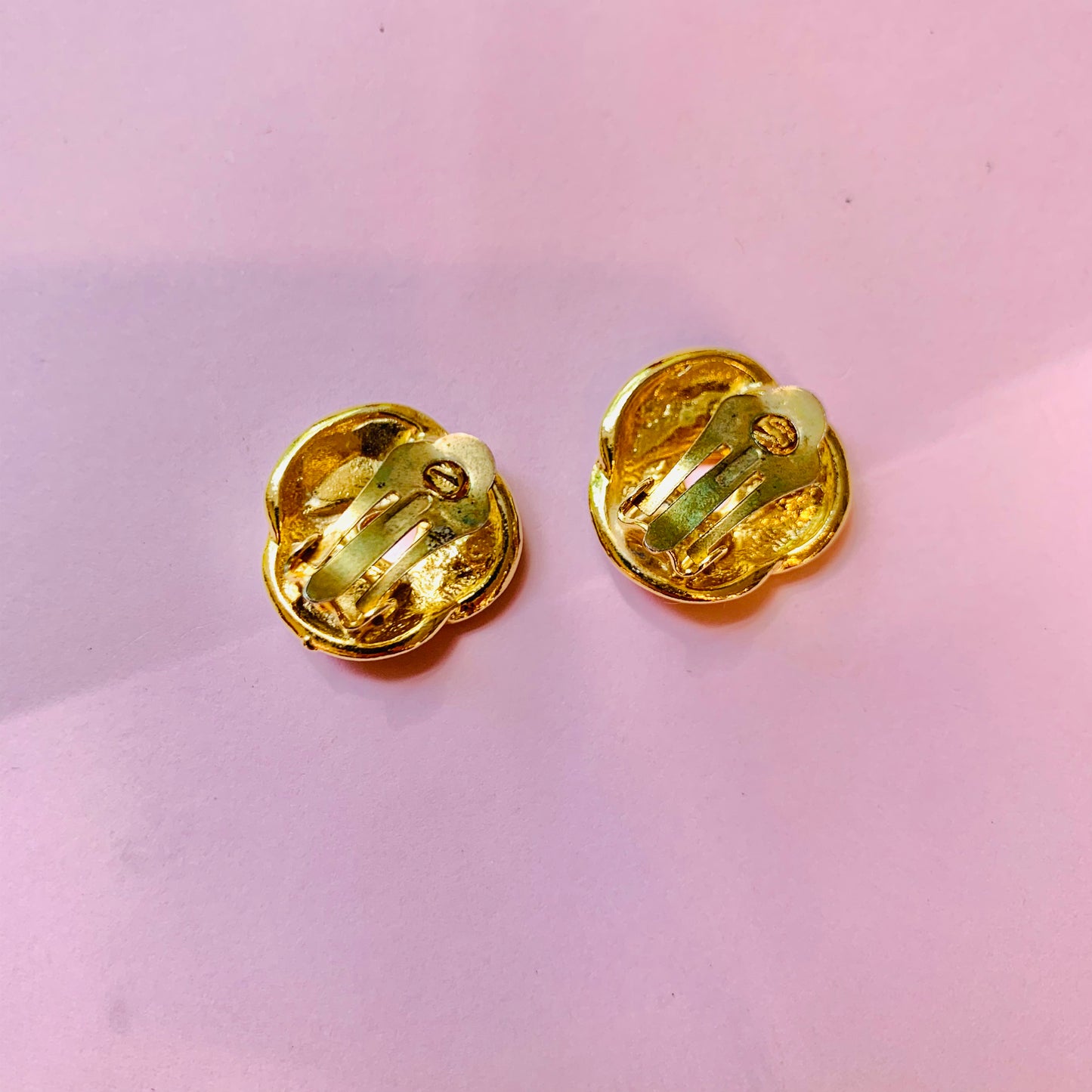 1960s Trifari gold plated black enamel knot button clip on earrings