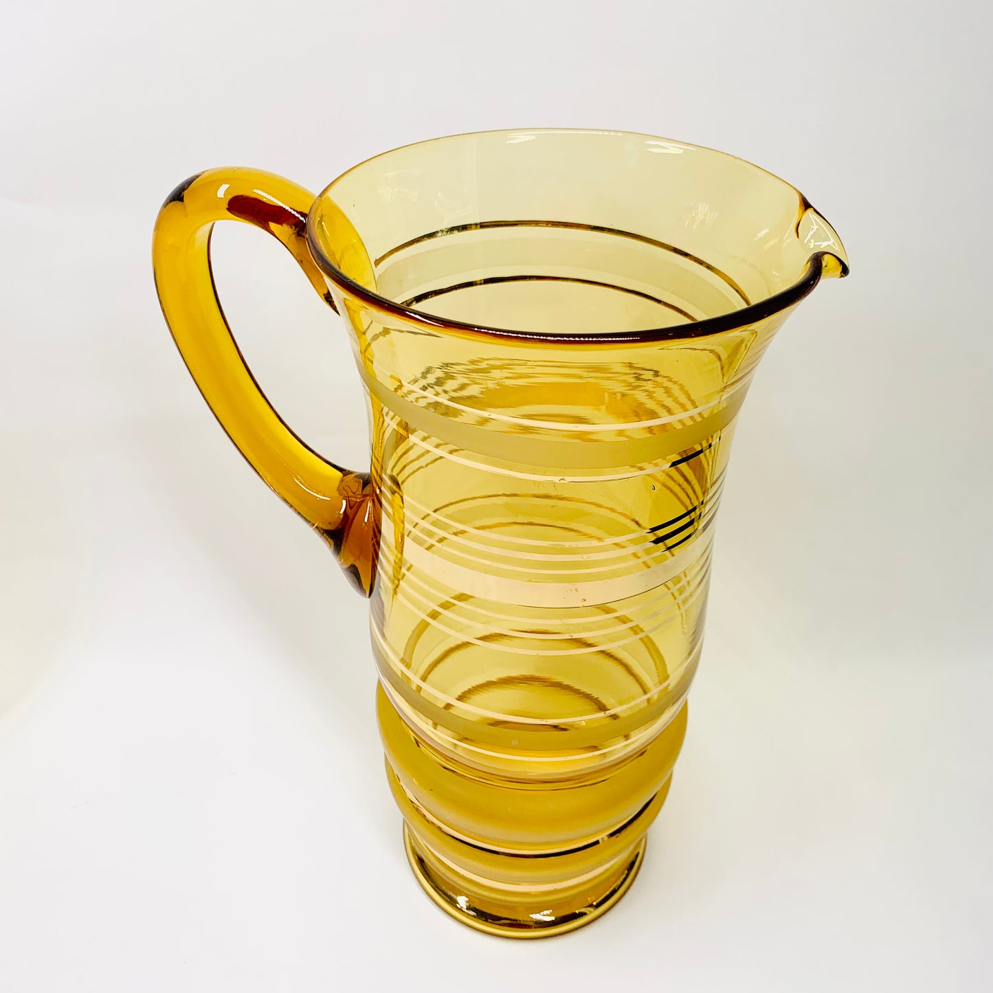 Midcentury gold gilded tall amber glasses and matching water jug/pitcher