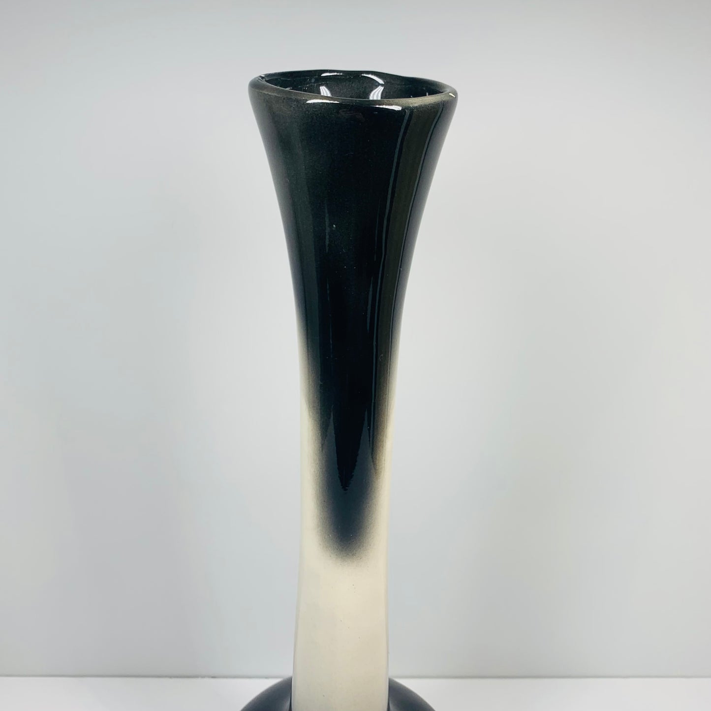 Space Age tall black and cream tie dye ceramic flute vase