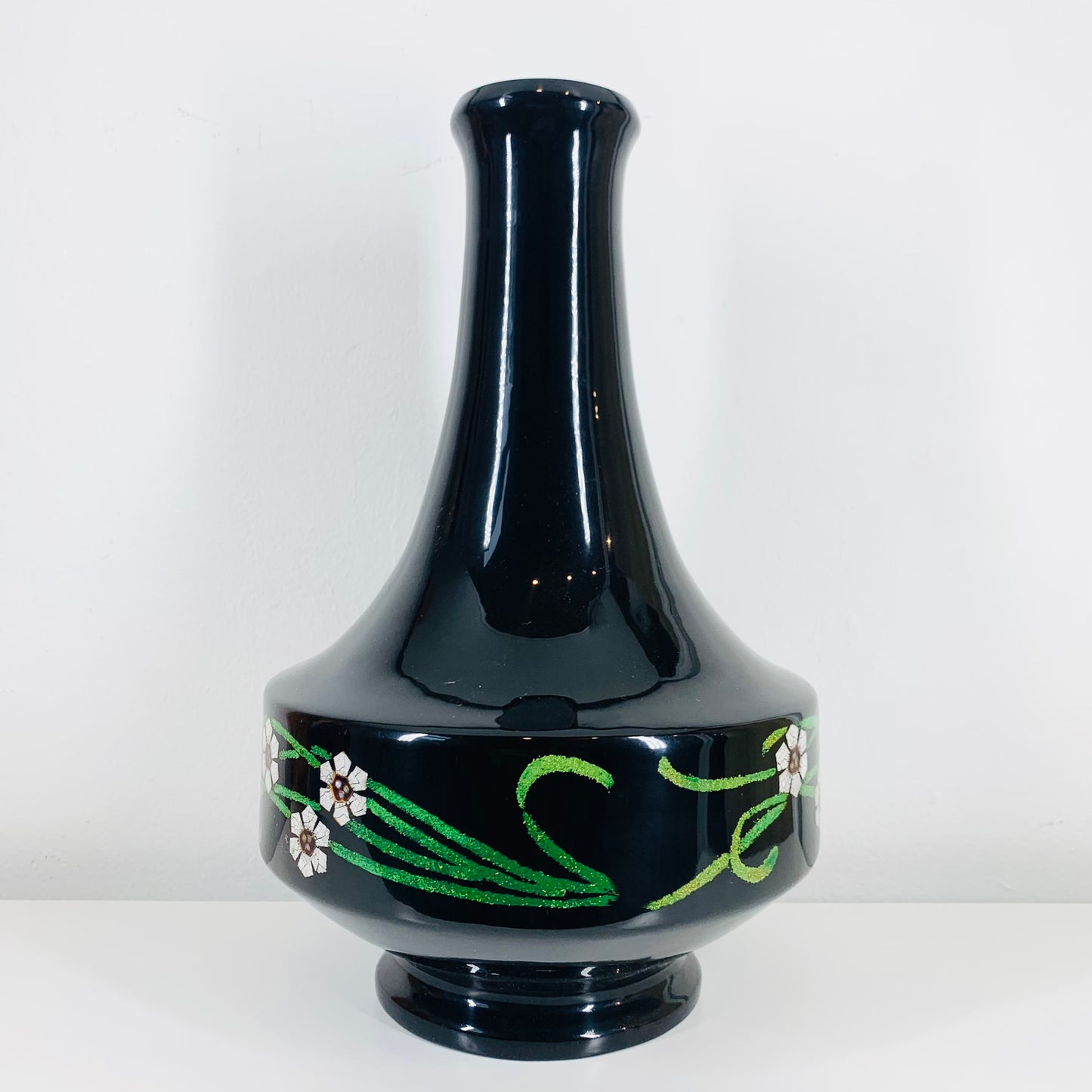 Large Midcentury Japanese black plastic vase with floral motif