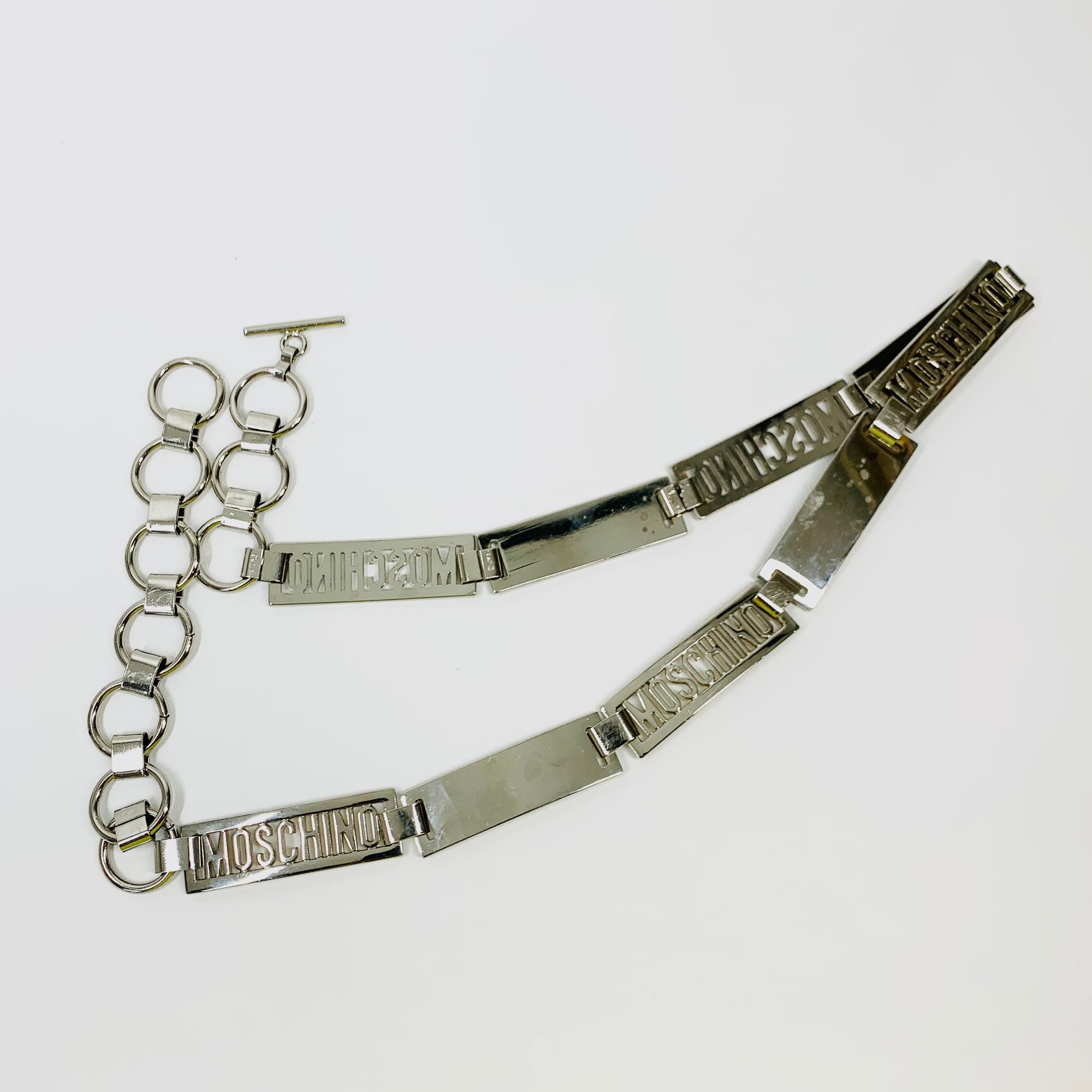 1980s MOSCHINO STAINLESS STEEL LOGO BAR BELT