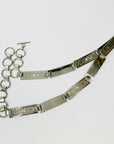 1980s MOSCHINO STAINLESS STEEL LOGO BAR BELT