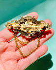 Stunning 1950s plated alloy Barcs brooch with red paste