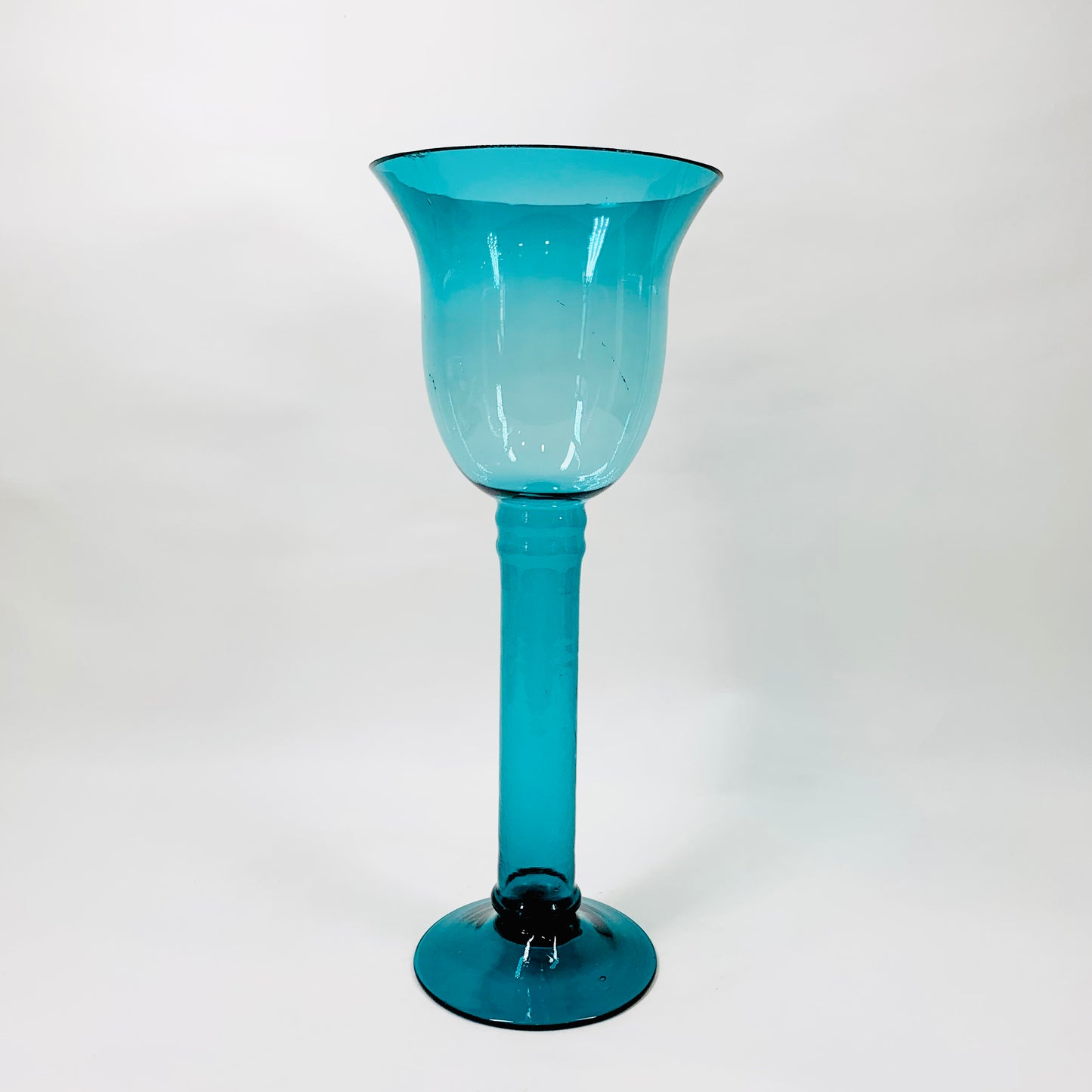 Vintage turquoise glass footed vase/candle holder