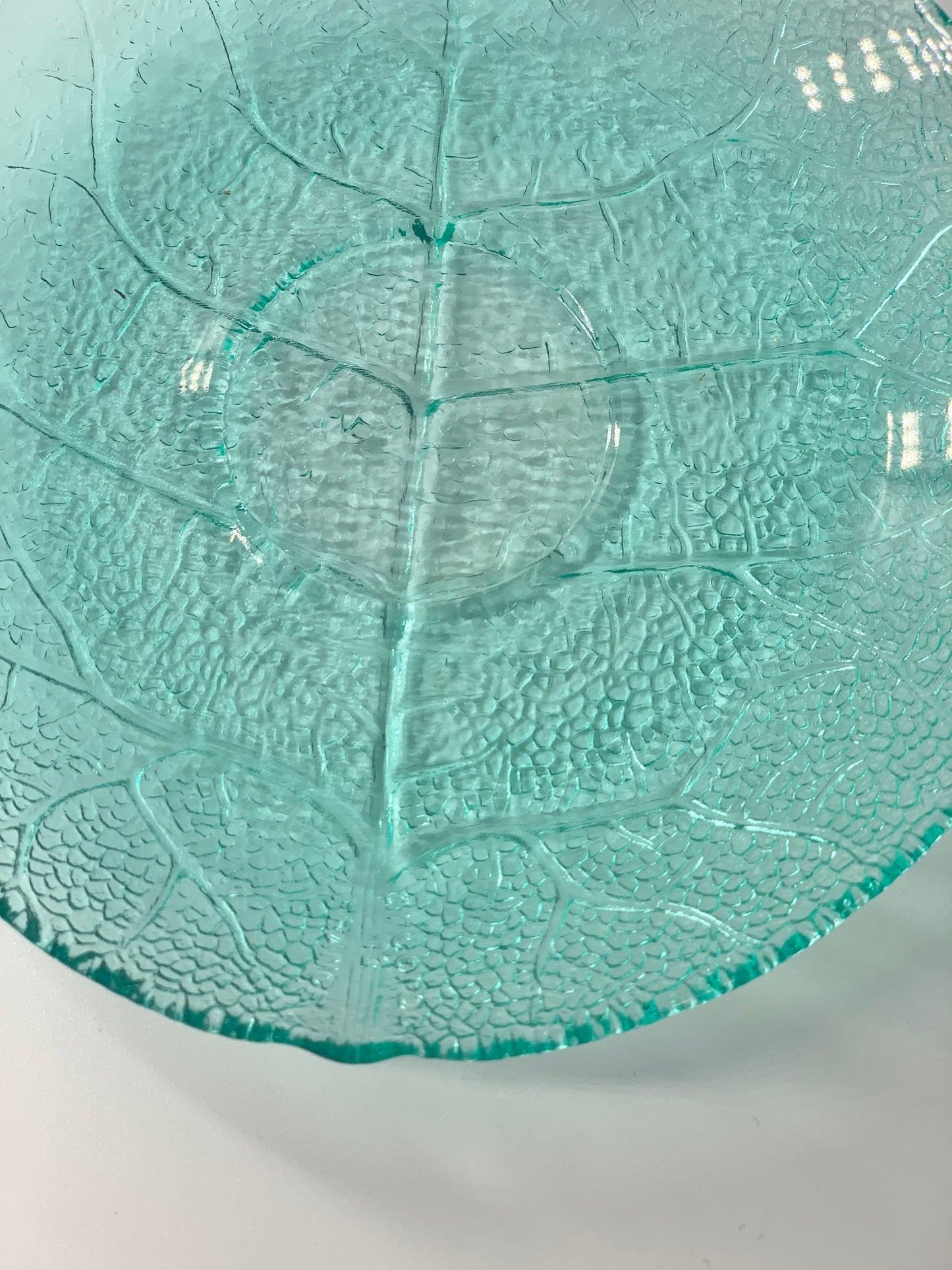 Retro textured leaf pattern teal glass Arcoroc tea cup and saucer