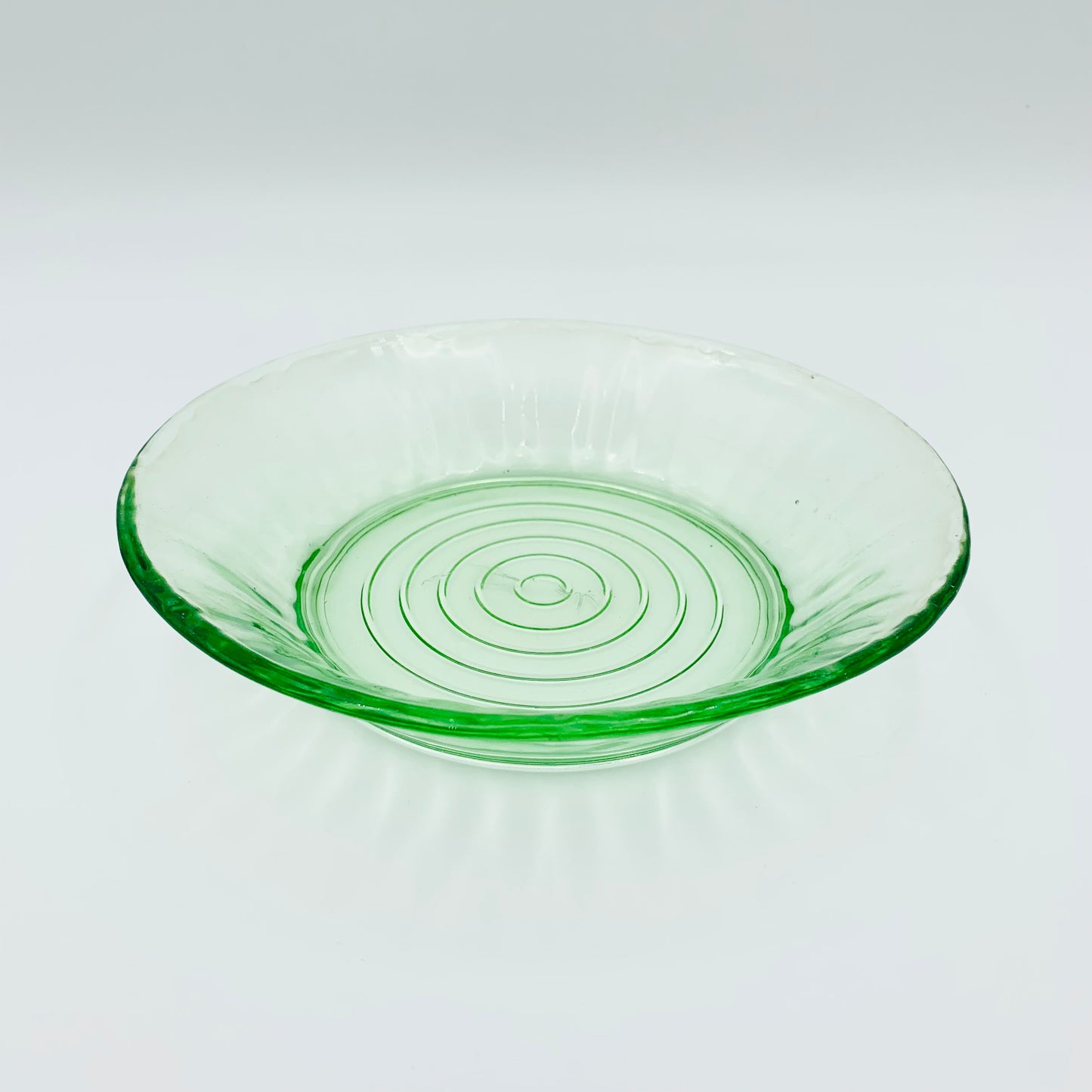 Green depression glass shallow soup bowl