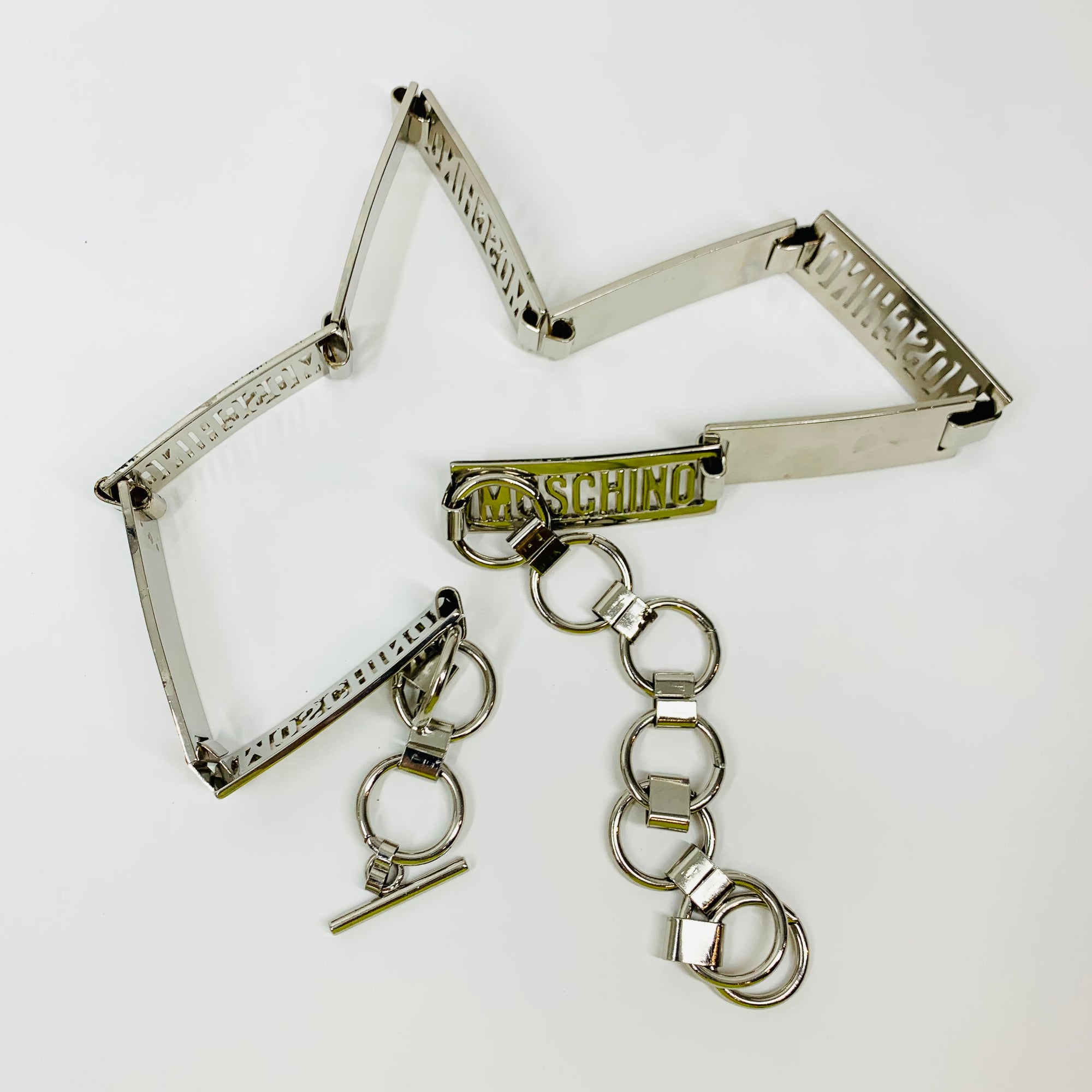 1980s MOSCHINO STAINLESS STEEL LOGO BAR BELT