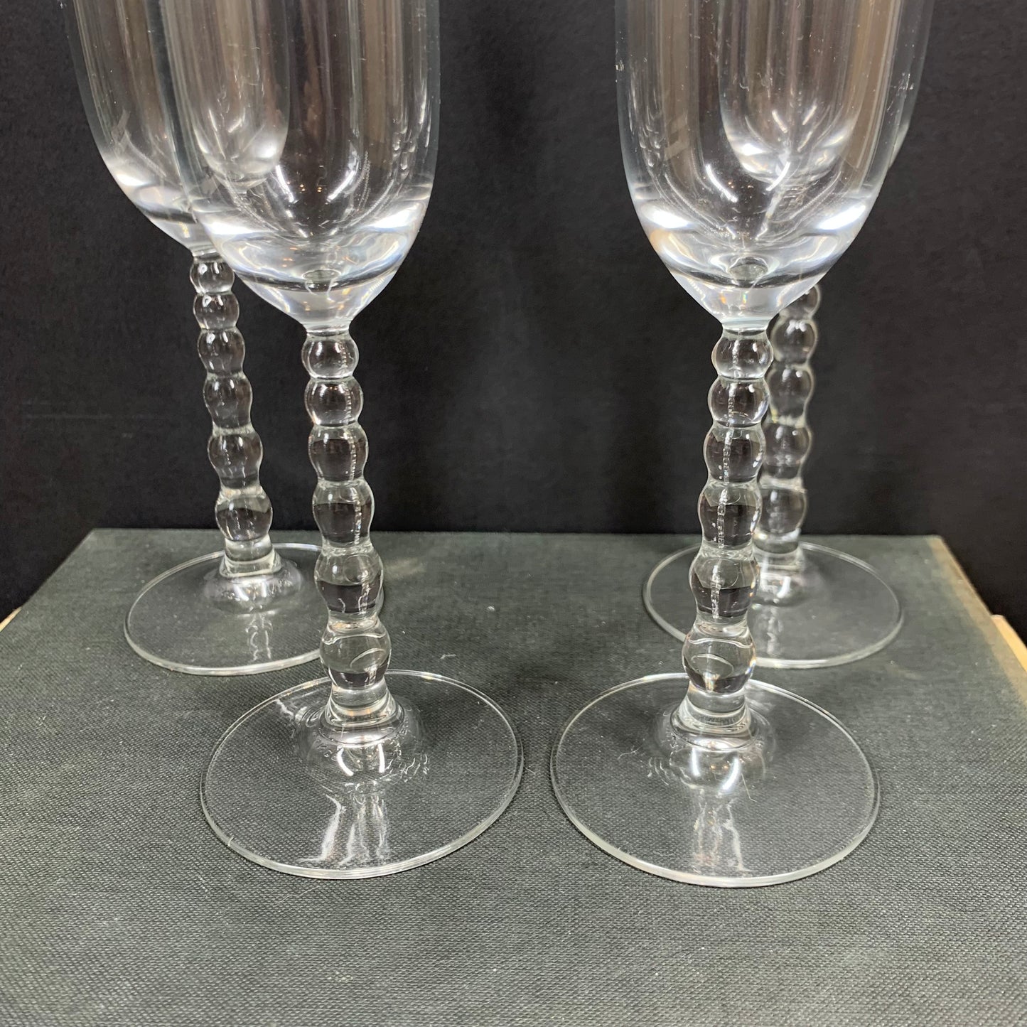 1980s Luminarc glass champagne flutes with droplet stem