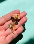 Antique hand carved coral rose brooch with jade leaves