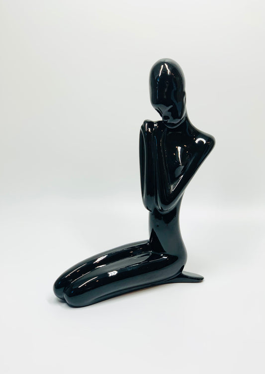 Midcentury black porcelain figurine