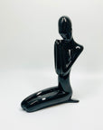 Midcentury black porcelain figurine