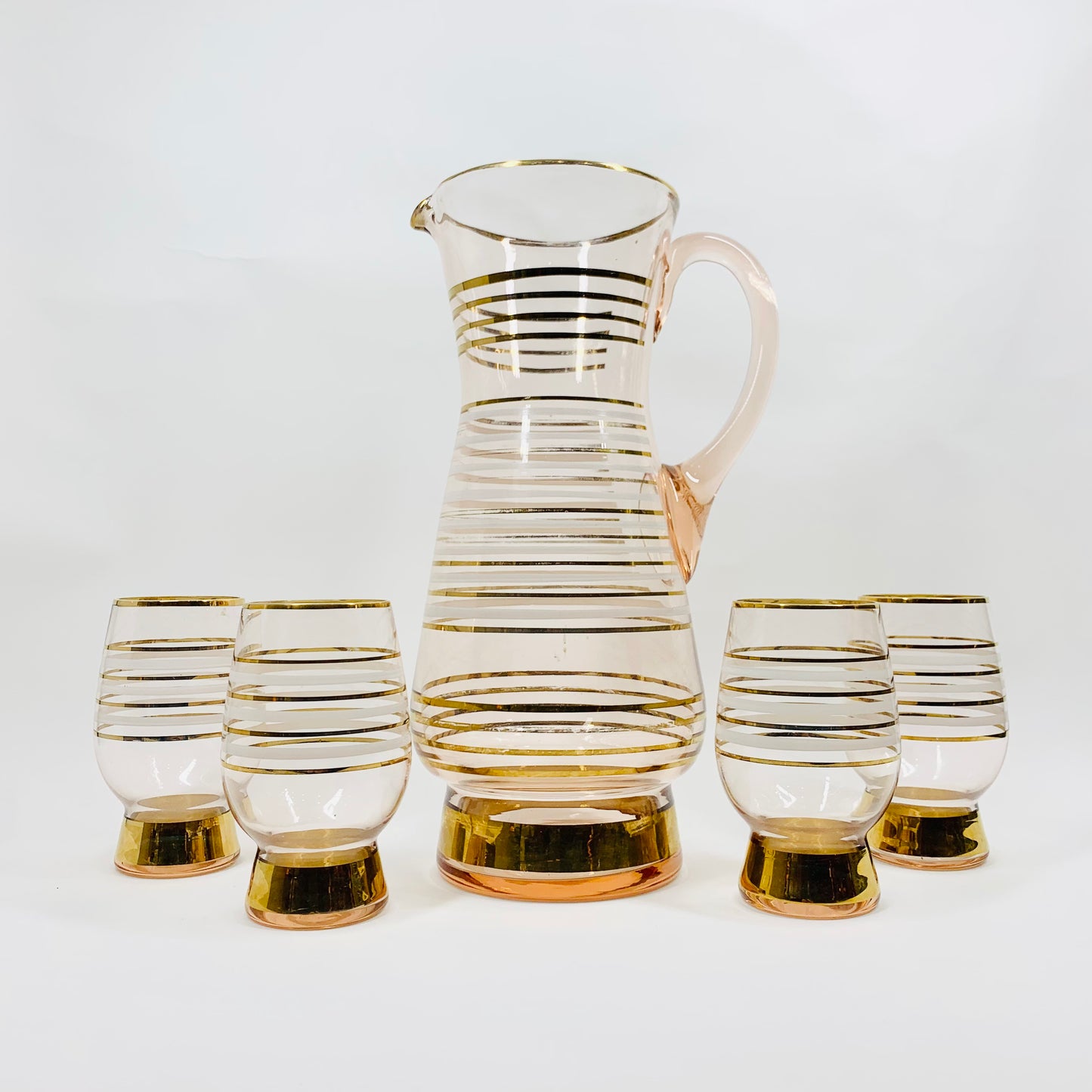 Midcentury complete set of pink glass with gold gilding jug and matching glasses