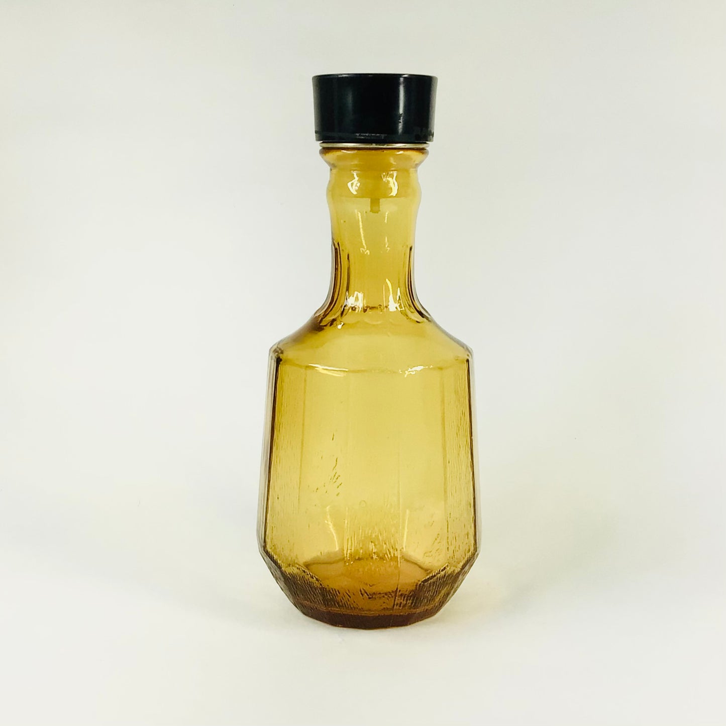 Midcentury glass oil carafe with plastic lid