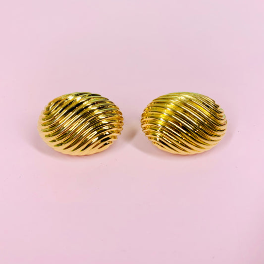 Rare 1970s triple gold plated ribbed cocoon clip on earrings by Monet