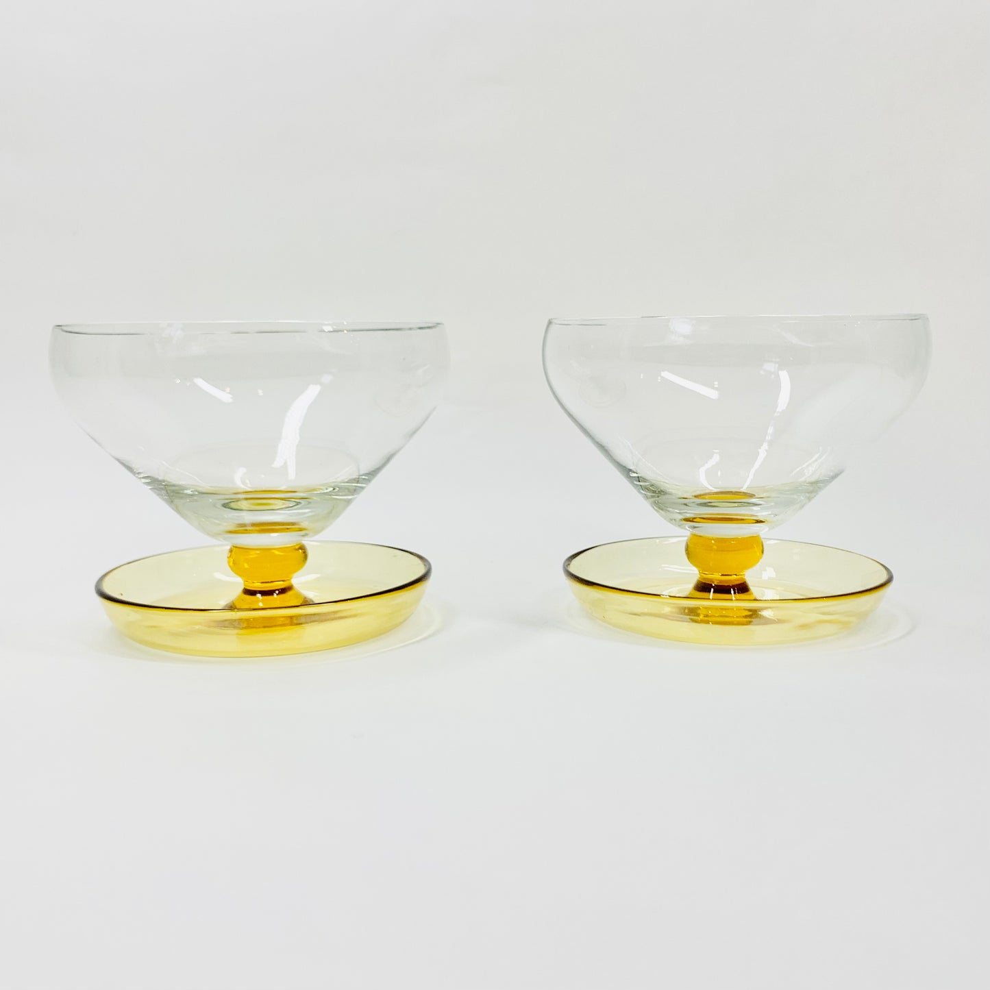 MCM glass coupe/dessert bowls with amber stem and base