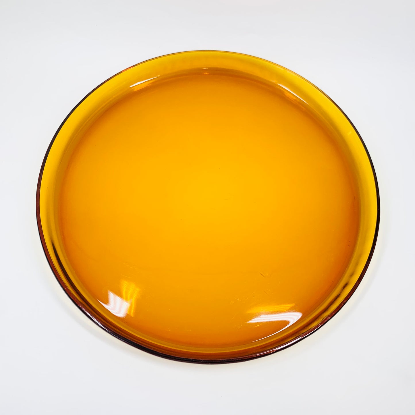 Large Midcentury amber glass serving plate with metal handle