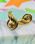 Rare 1980s triple gold plated wings earrings by Monet