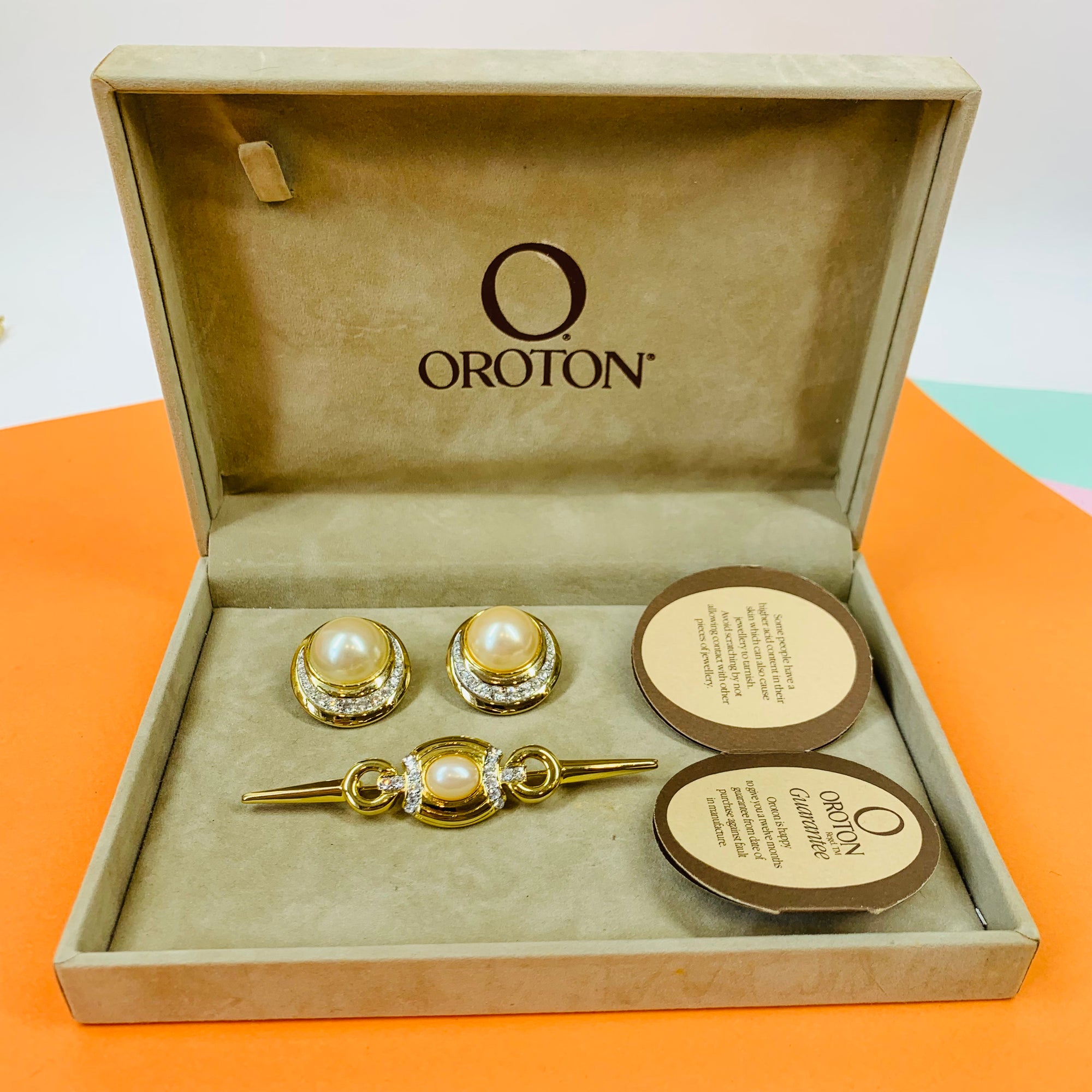 Vintage Oroton pearl gold brooch and matching earrings