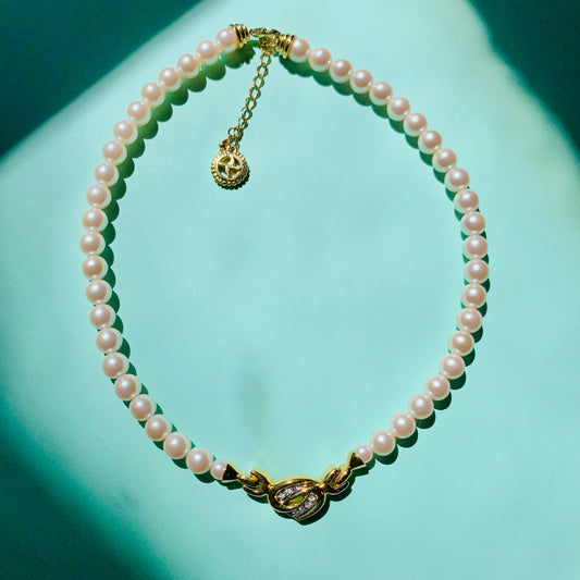 1960s Avon costume pearl necklace with infinity pendant