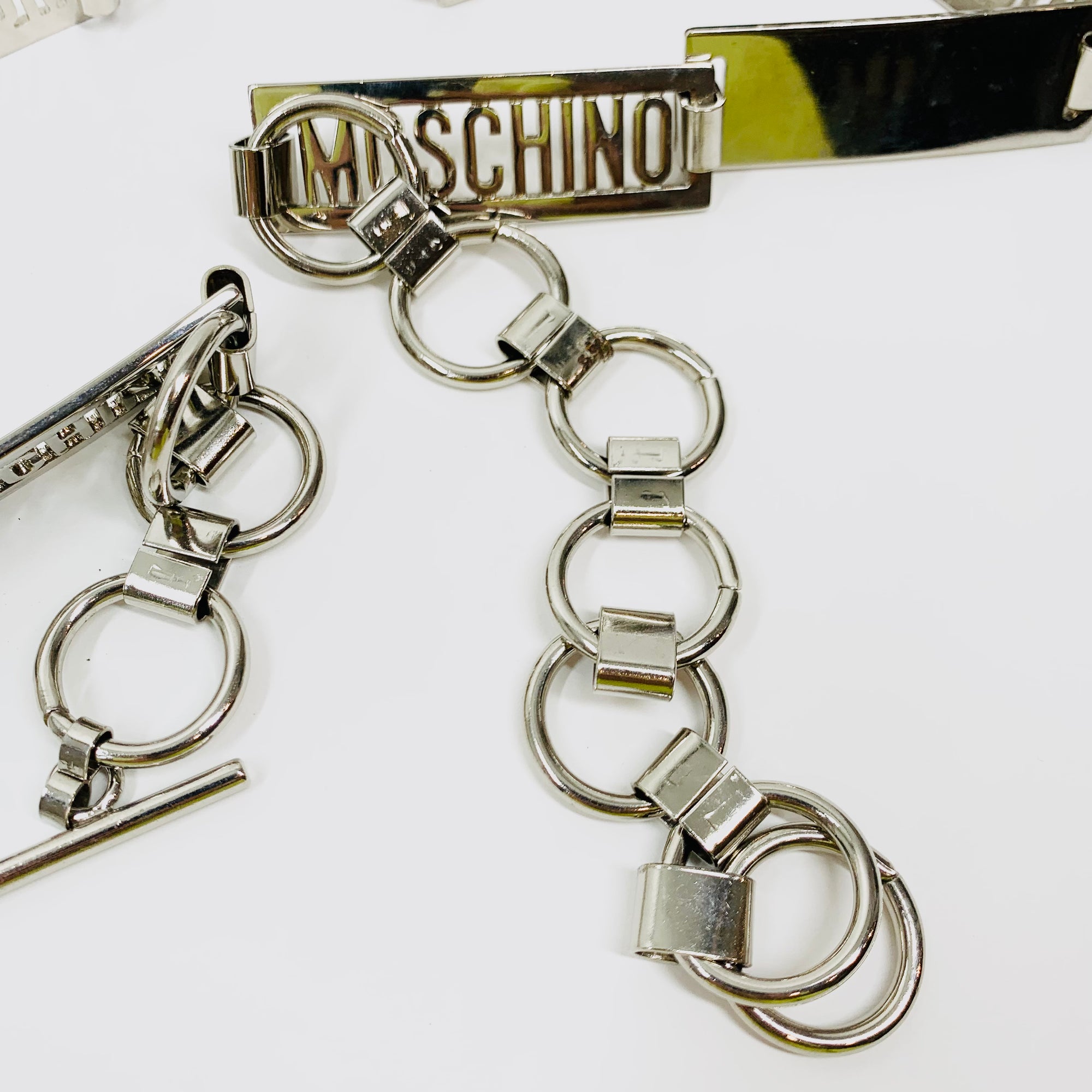 1980s MOSCHINO STAINLESS STEEL LOGO BAR BELT