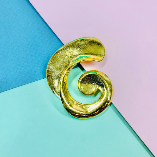 1980s gold plated scroll brooch