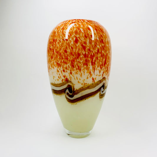 Vintage hand made orange cased art glass vase with abstract pattern