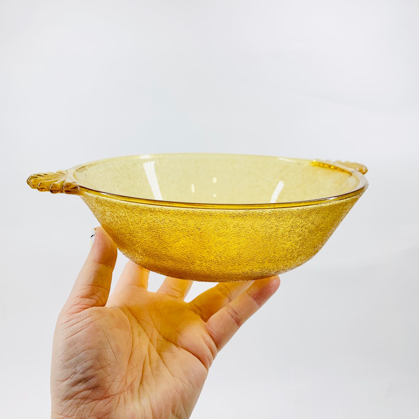 Midcentury laminated amber glass bowl with handles