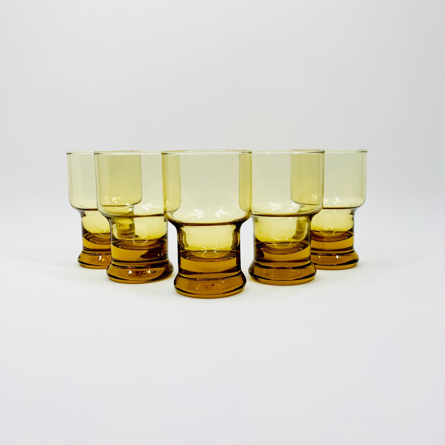 MCM amber shot glasses with paperweight base